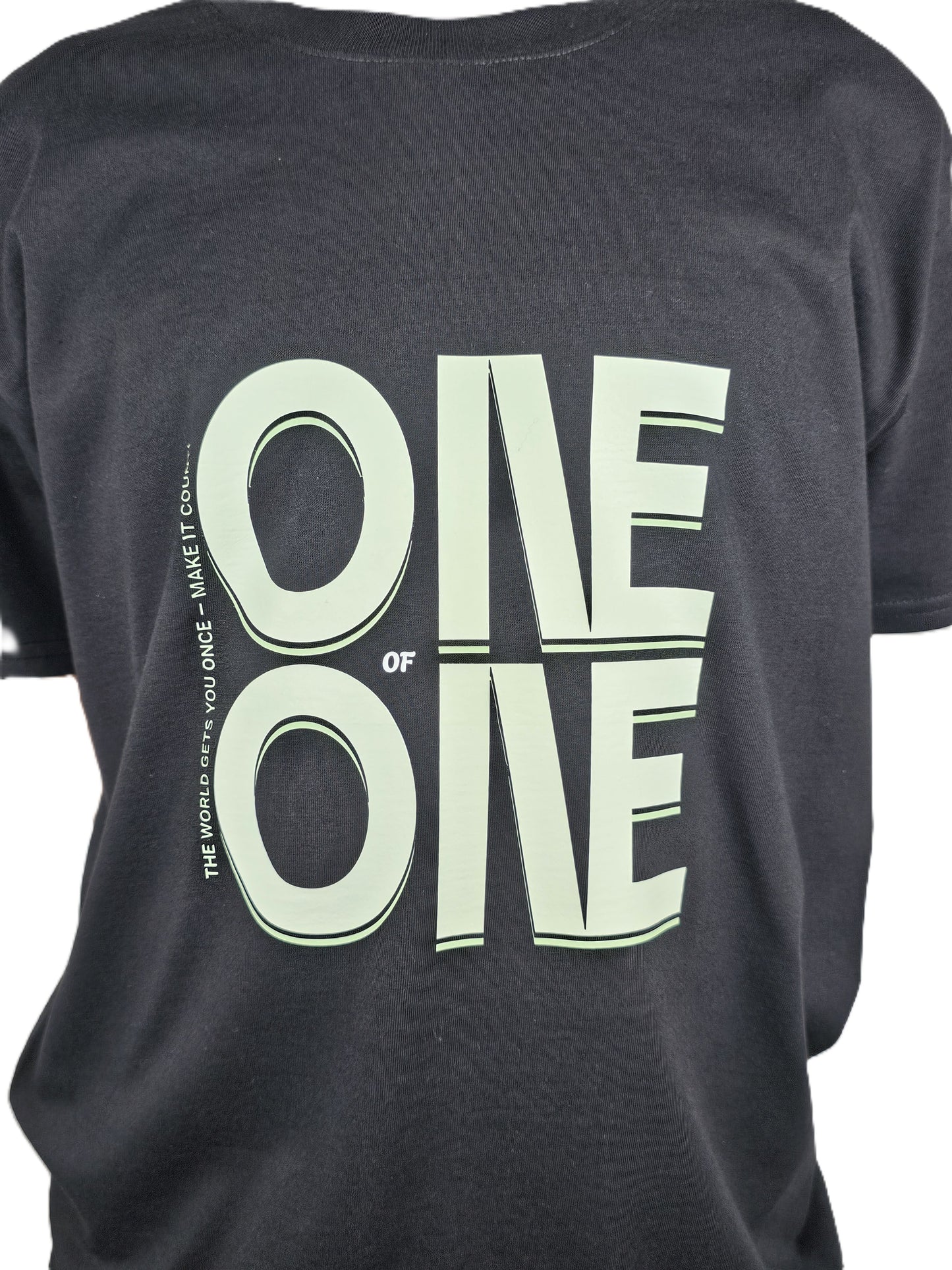 Black t-shirt with 'ONE OF ONE' text design on a plain background