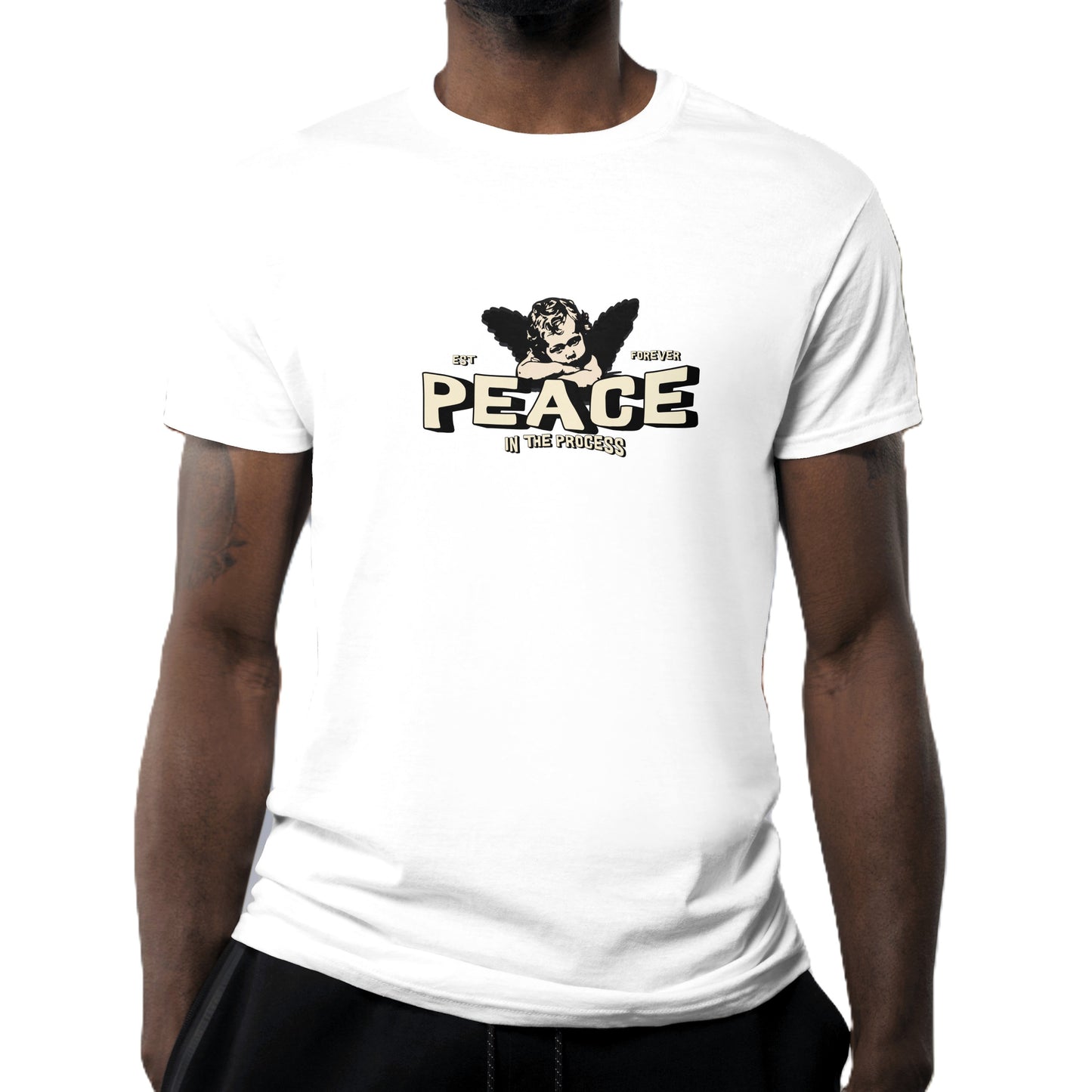 White t-shirt with 'PEACE' graphic design worn by a person on a white background