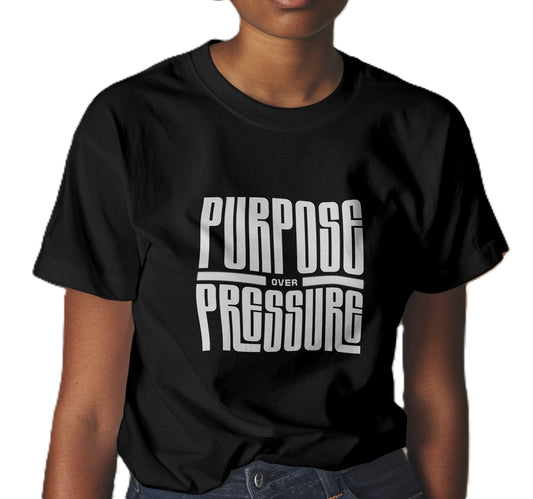 Person wearing a black t-shirt with 'Purpose Over Pressure' printed in white text